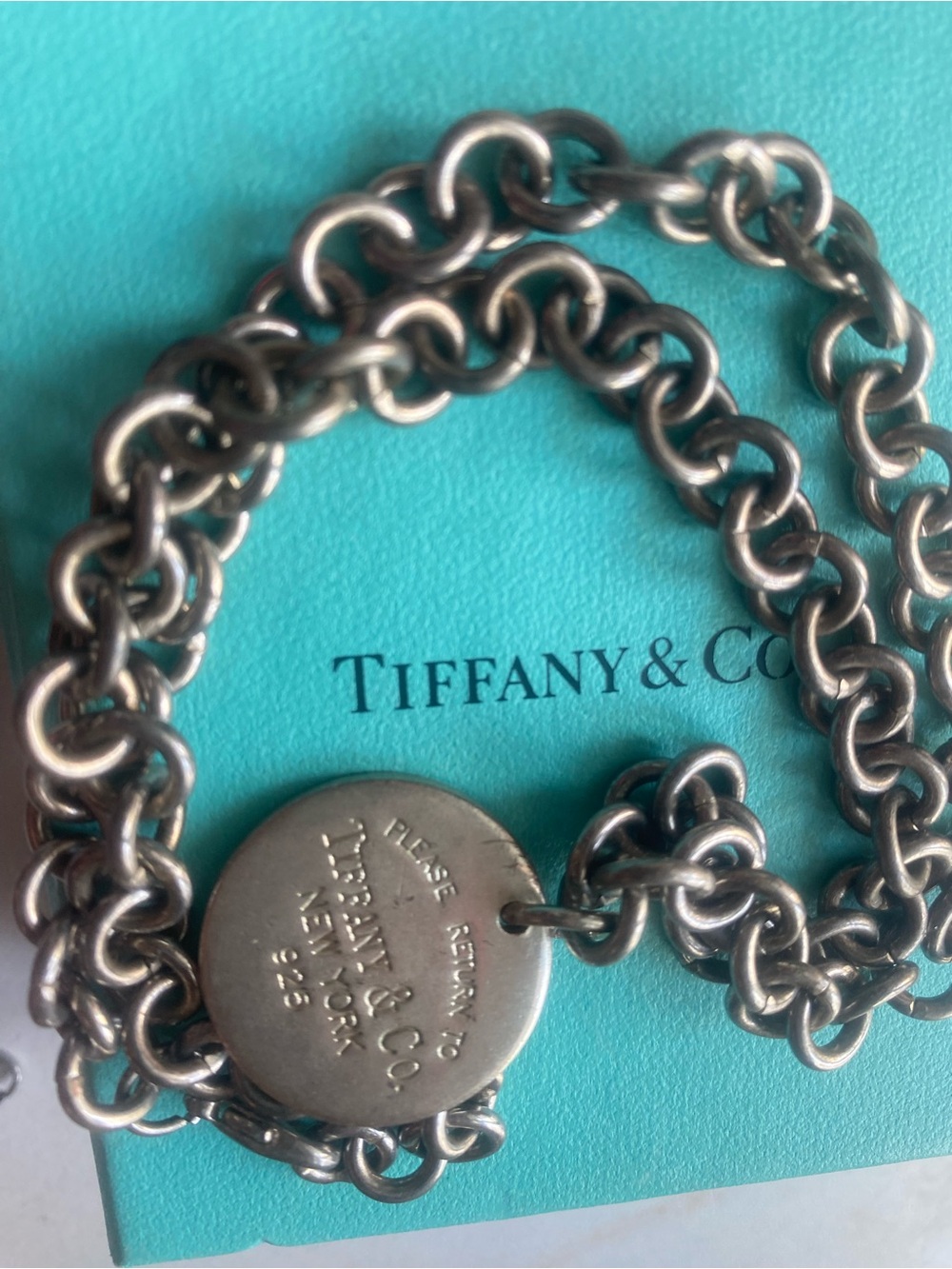 Tiffany & Co. Sterling Round Tag Link Bracelet in Turquoise and Silver.